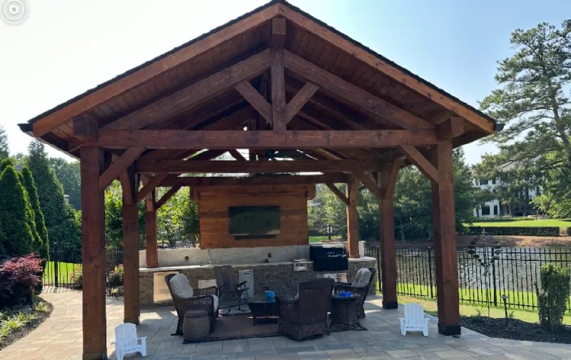 Worker working on the roof shingles